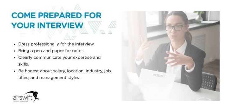 Woman talking in an interview dressed smartly