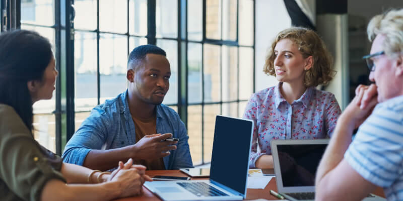 Diverse tech team in a meeting