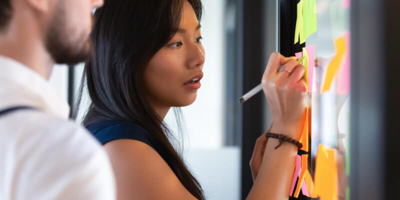 Tech Talent working on a project sprint in SCRUM