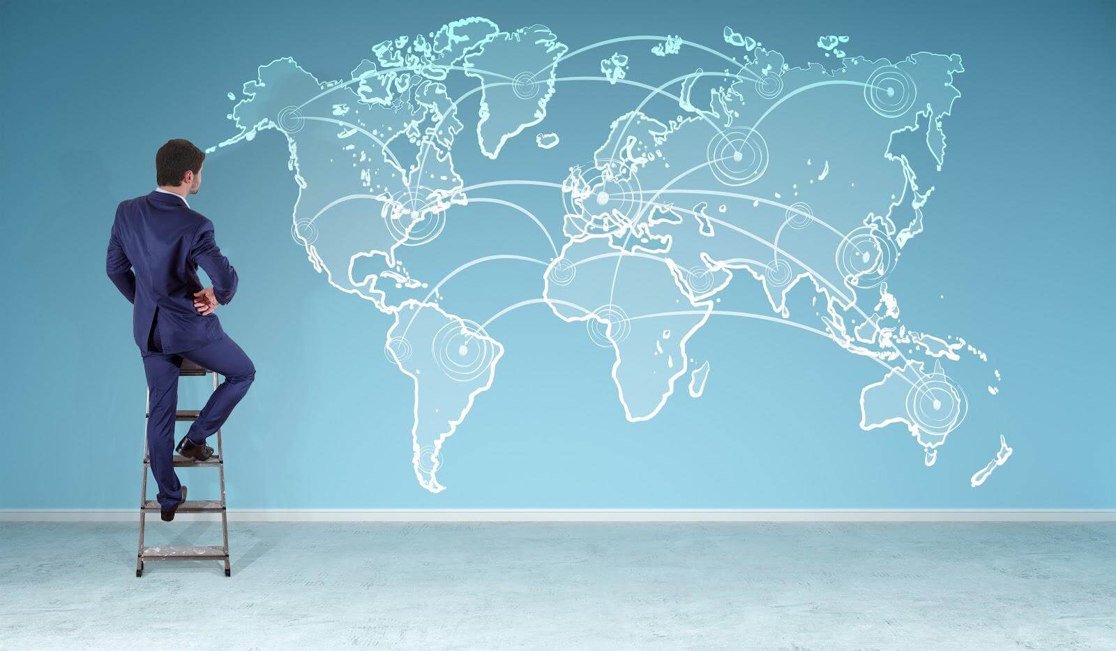 Professional examining international business connections on a world map.