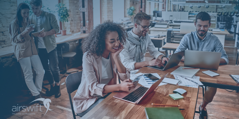 Office workers talking about a project