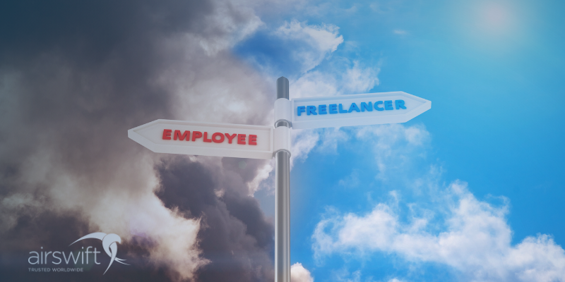 A two way sign with the words employee and freelancer